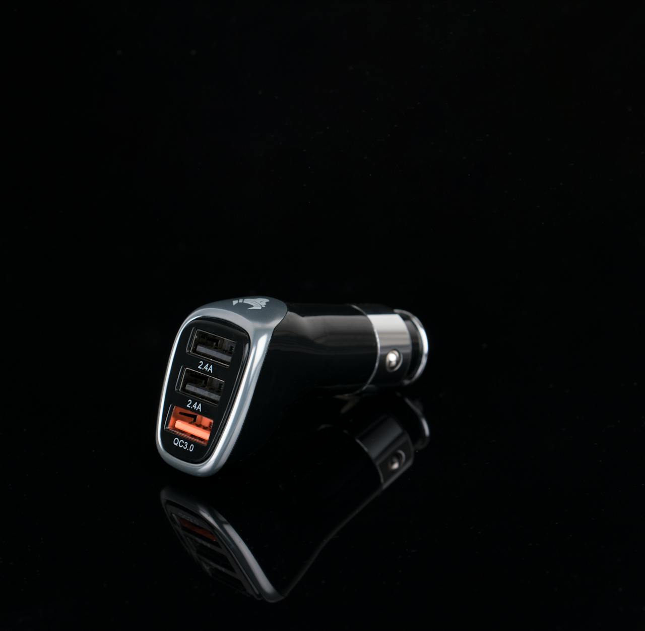 why-choose-us Sleek black car charger featuring multiple USB ports for versatile device charging.